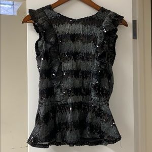 Sequin peplum top with frills